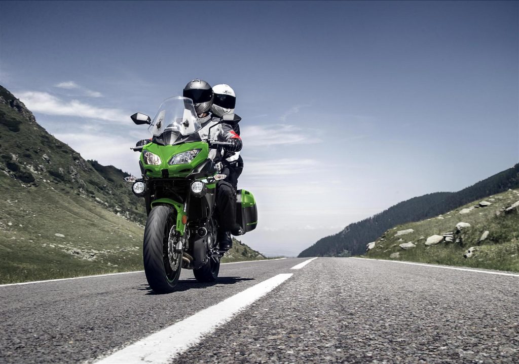 Two riders on Kawasaki Versys 650 ABS LT on mountain road