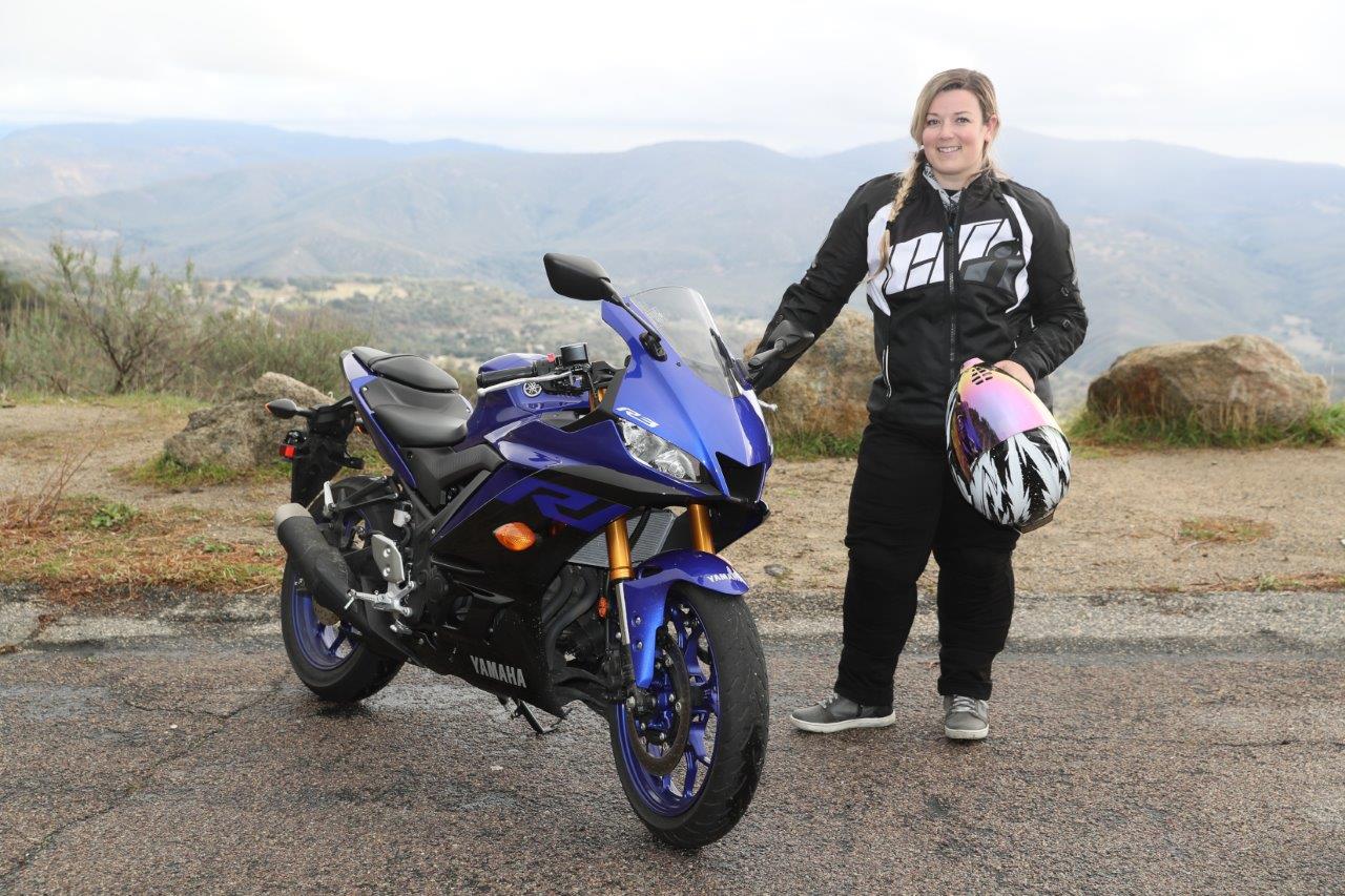 Brittany Morrow posing with the 2019 Yamaha YZF-R3