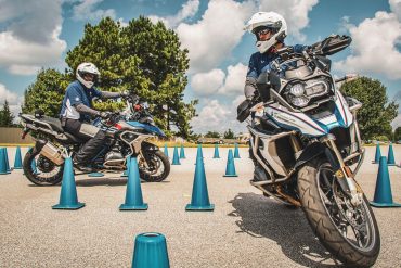 Riders practicing essential safety skills during "Five to Survive" training