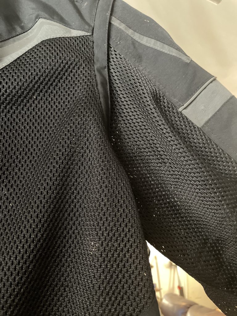 Close up of perforated textiles used in Scorpion EXO riding jacket