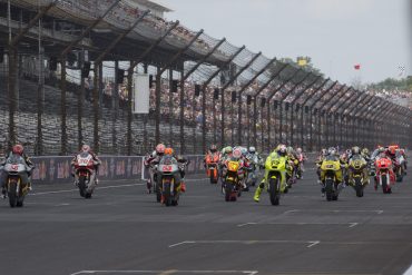 Motorcycle racers on the MotoGP racetrack