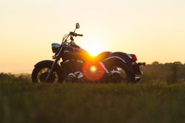 Cruiser motorcycle against sunset